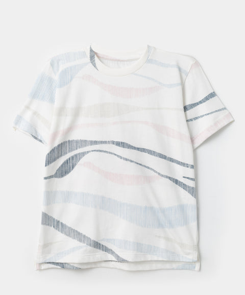 Camiseta manga corta para bebé niño en tela suave color crudo con estampado abstracto