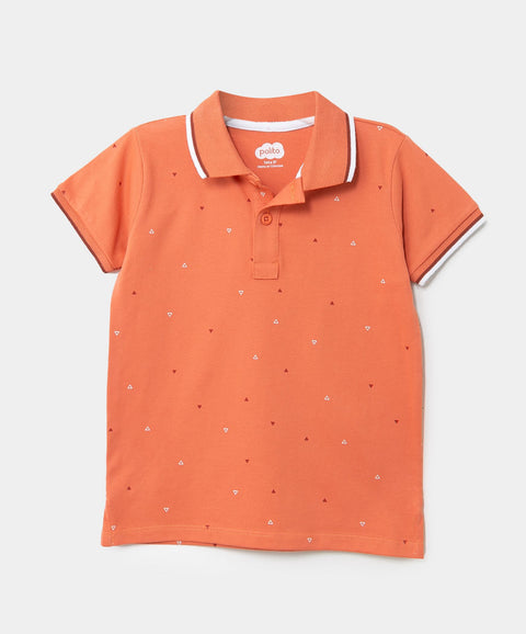 Camiseta Tipo Polo Estampada Para Niño En Algodón Color Terracota