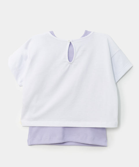Camiseta sobrepuesta para bebé niña en licra color blanco con lila