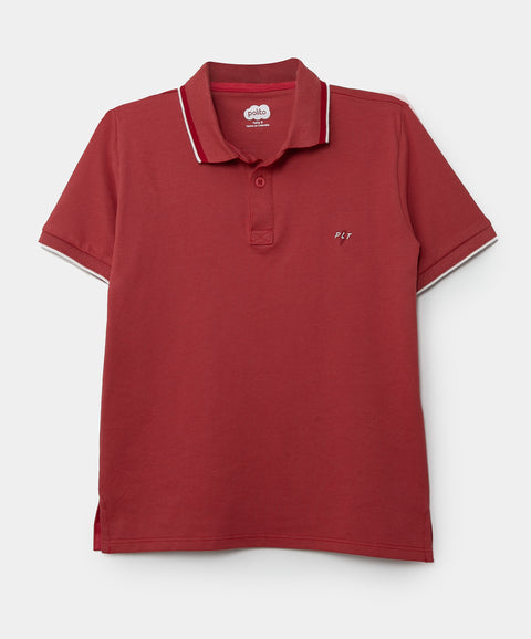 Camiseta tipo polo para niño en algodón color rojo