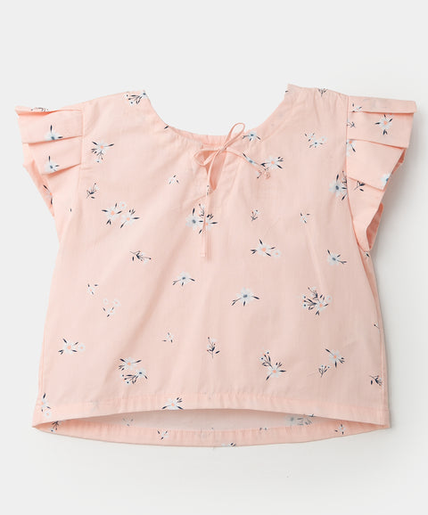 Blusa manga corta para niña en popelina color rosado con estampado de flores