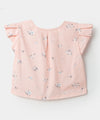 Blusa manga corta para niña en popelina color rosado con estampado de flores