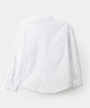 Camisa manga larga para niño en tela stretch color blanco con estampado de bicicletas