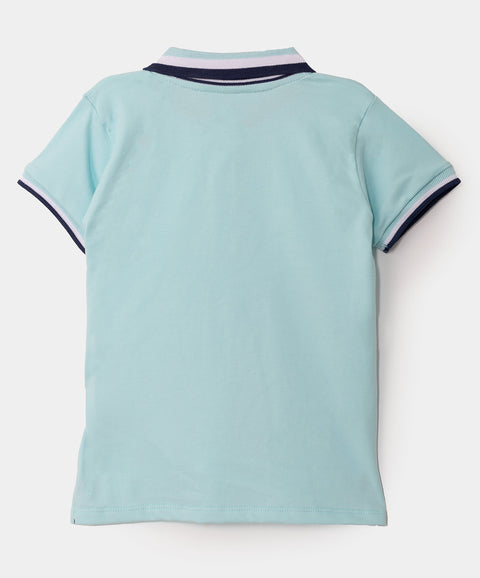 Camiseta tipo polo para niño en algodón color aqua