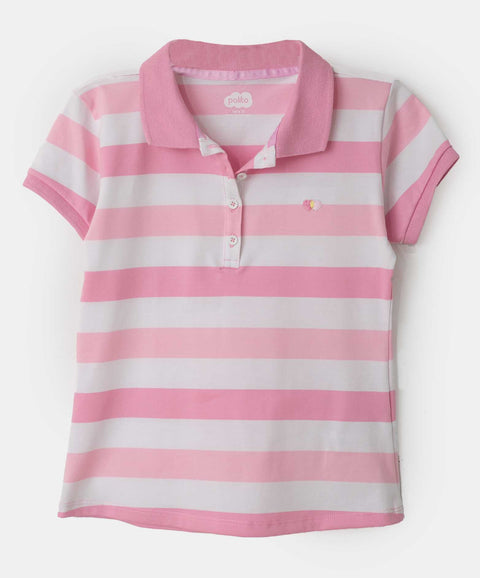 Camiseta tipo polo para niña en algodón color mora pastel