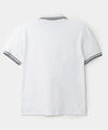 camiseta tipo polo blanca para niños