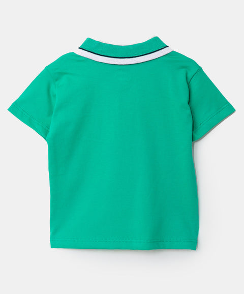 Camiseta tipo polo para recién nacido en algodón color verde esmeralda