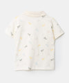 Camiseta tipo polo para recién nacido en algodón color marfil