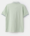 Camiseta tipo polo para niño en algodón color verde claro