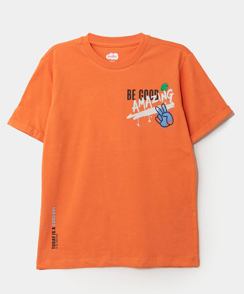 Camiseta manga corta para niño en tela suave color naranja