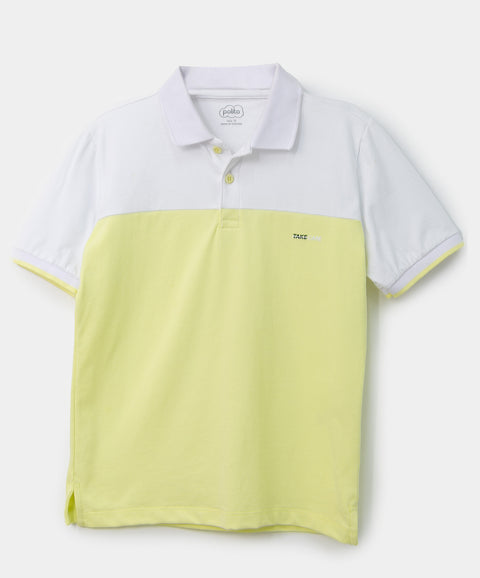 Camiseta tipo polo para niño en algodón color lima con blanco
