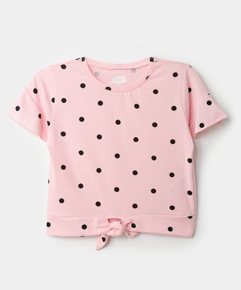 Blusa manga corta para niña en licra color rosado con estampado de puntos negros