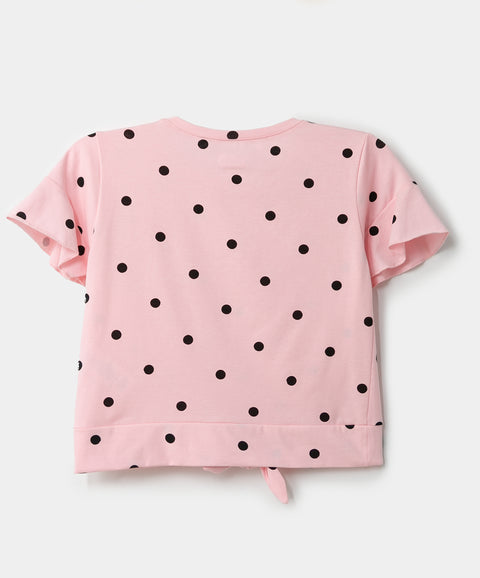 Blusa manga corta para niña en licra color rosado con estampado de puntos negros