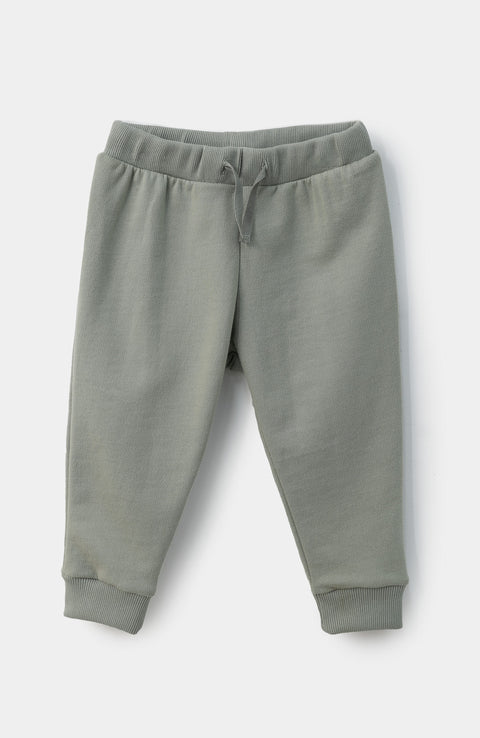 Set x 3 de buzo, body y pantalón para recién nacido en tela suave y burda color marfil con verde