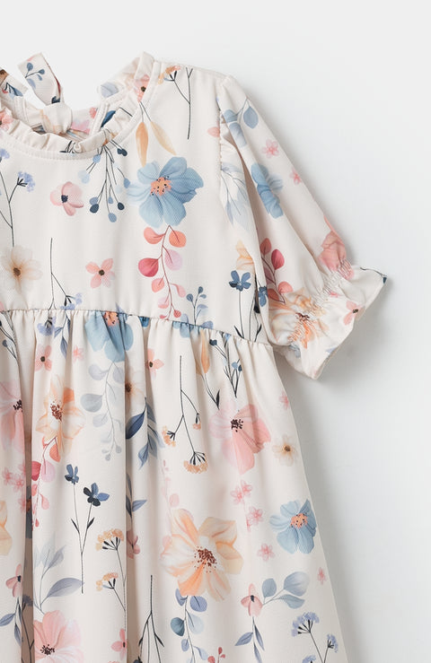 Vestido para bebé niña en poliéster color vainilla con estampado de flores